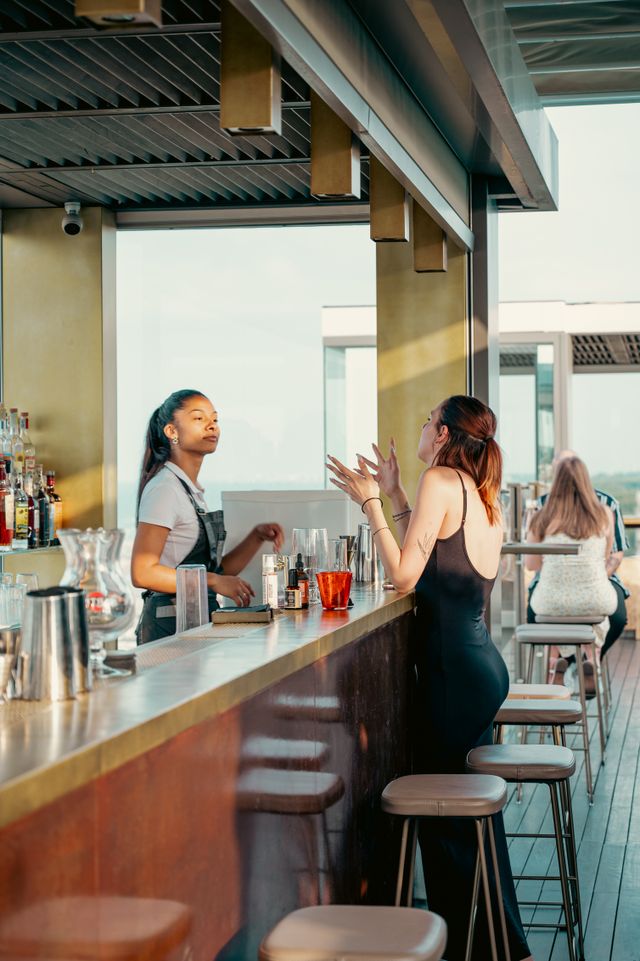 rooftop bar in los angeles, people talking